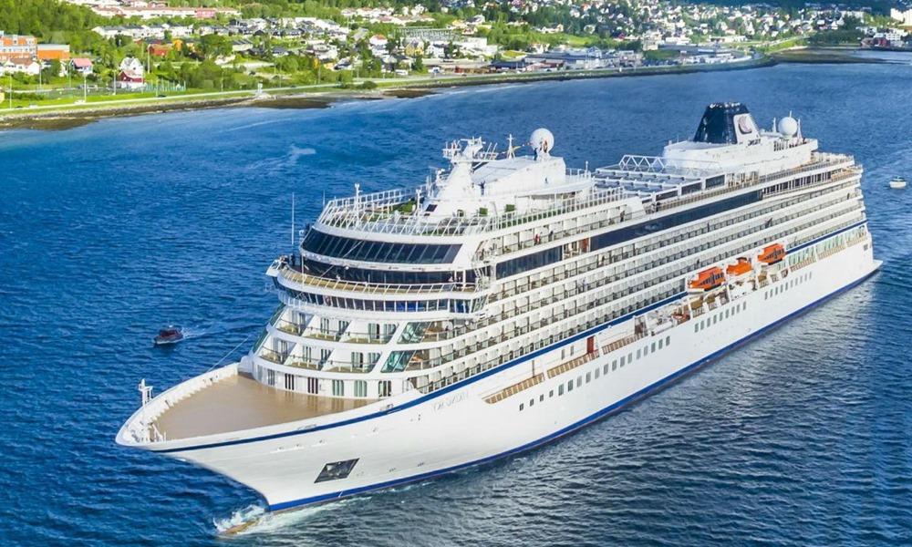 MV Coral Regent passing a lush Caribbean island